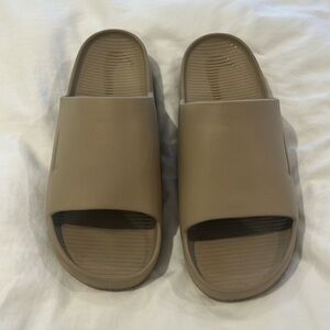 Nike Calm Slides in Brown/Tan, size M12/W13